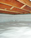 a moisture barrier installed on the walls and floors of a crawl space in Rosman