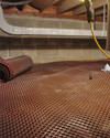Crawl space drainage matting installed in a home in Cedar Mountain