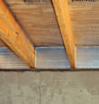 SilverGlo™ insulation installed in a floor joist in Penrose