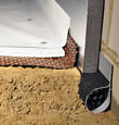 Rosman installation of SilverGlo™ insulation with our crawl space pipe, drainage matting, floor insulation, and crawl space moisture barrier.