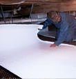 Highlands insulation being installed in a crawl space.