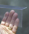 Closeup of a clear plastic covering on a Tuckasegee crawl space block wall