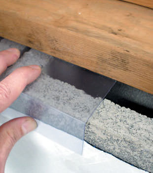 Block wall clear covering for wet crawl spaces in Tuckasegee