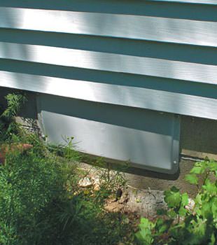 A gray crawl space vent cover in Balsam Grove