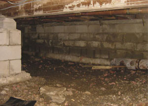 Rotting, decaying crawl space wood damaged over time in Sylva